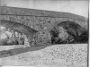 print of stone bridge across Napa River.